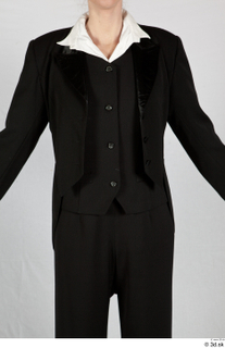  Photos Woman in Historical Dress 39 20th century Historical clothing black historical suit black suit upper body 0001.jpg